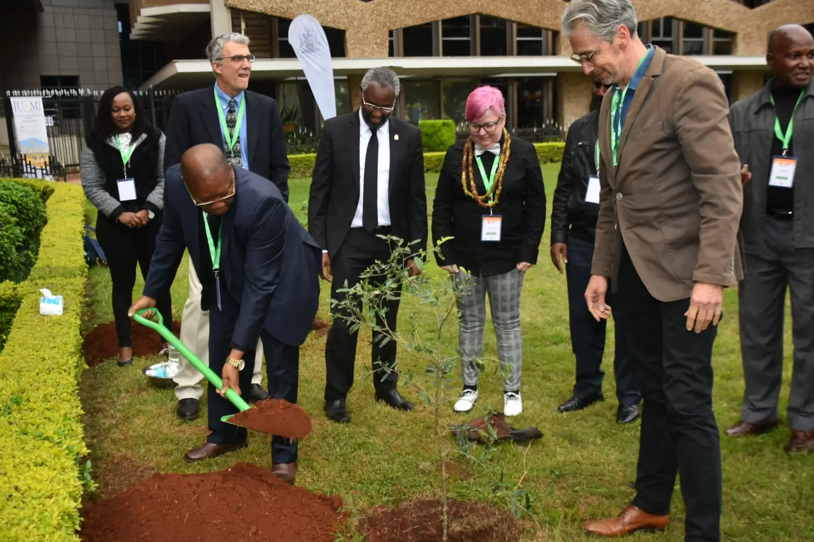 Dr. Boniface Kiteme together with Prof. Stephen Kiama, Prof. Charles Schweik, Prof. Tobias Haller and the joint organizaing commitee in a tree planting session at the University of Nairobi Dr. Boniface Kiteme together with Prof. Stephen Kiama, Prof. Charles Schweik, Prof. Tobias Haller, and the joint organizing committee in a tree planting session at the University of Nairobi